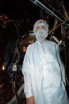 Photograph of Brian Nixon with MRO spacecraft