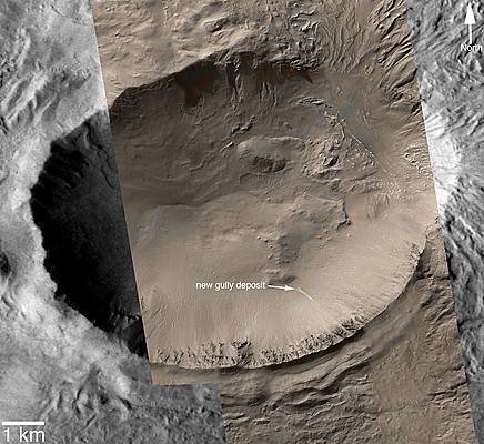 Mosaic of MOC and a THEMIS VIS image showing the entire crater in which the new gully deposit occurs. The new light-tone deposit is shown in the southeast quarter of the crater.